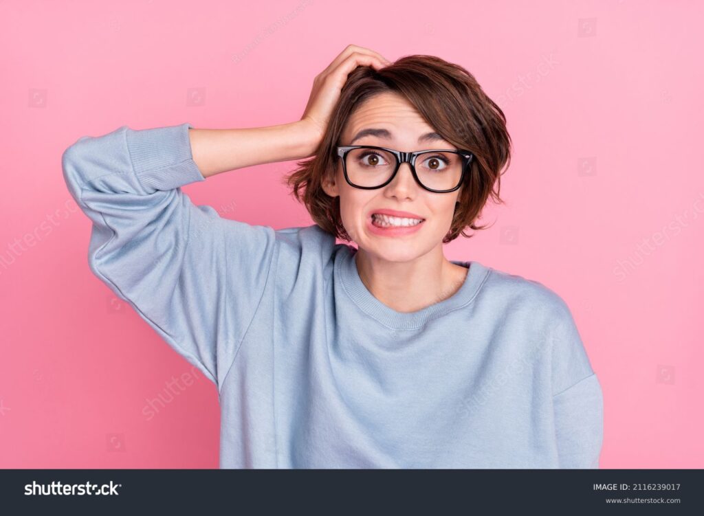 woman feeling awkward in need of excuses for screenshotting